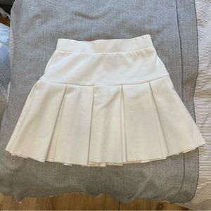 Pleated white varsity skirt form Lioness
